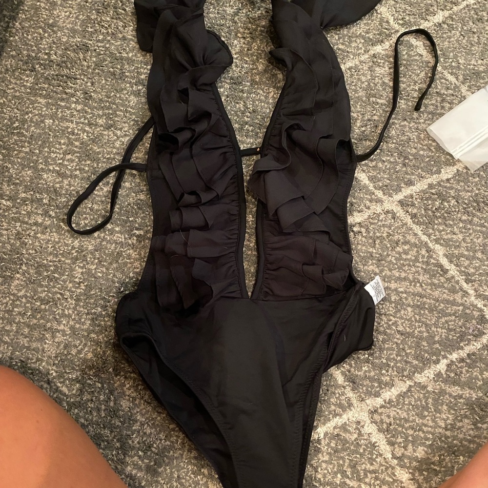 black ruffle one piece